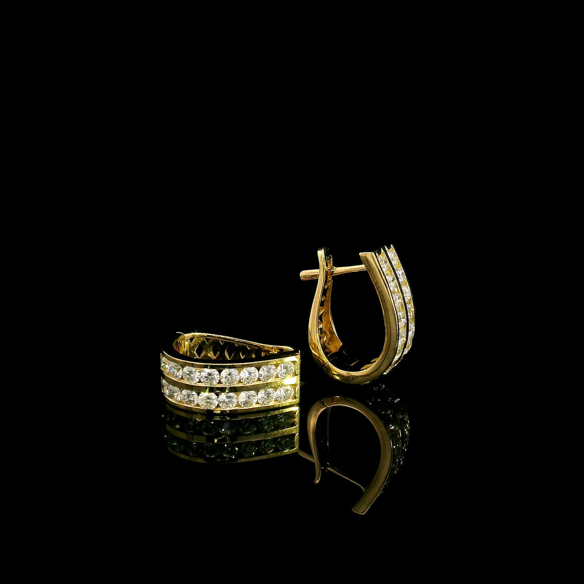 Double row diamond hoop earrings in 18K yellow gold featuring two parallel rows of round brilliant diamonds.