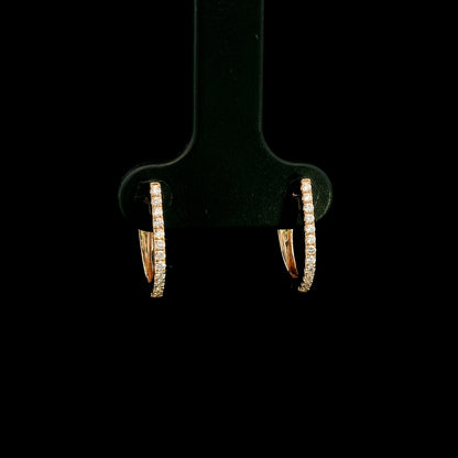 Diamond hoop earrings in 18K rose gold with round diamonds and elongated design