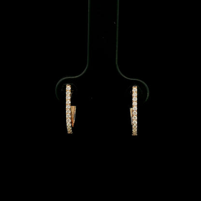Diamond hoop earrings in 18K rose gold with round diamonds and elongated design