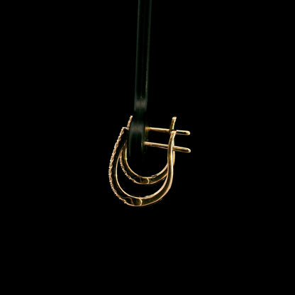 Diamond hoop earrings in 18K rose gold with round diamonds and elongated design