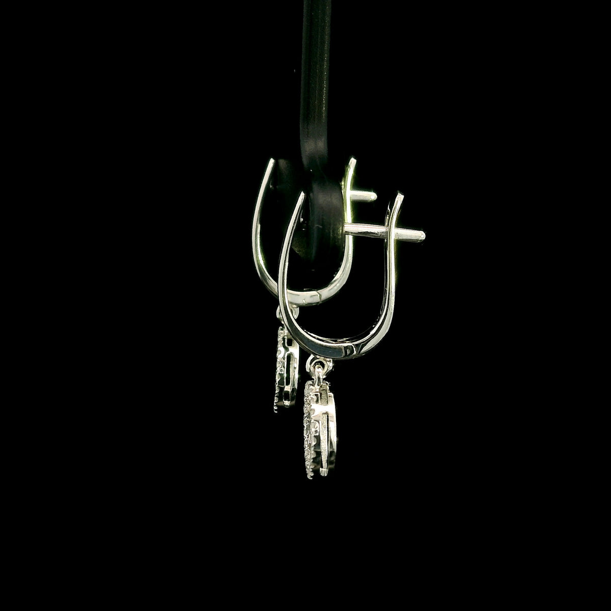 Diamond drop earrings in 18K white gold with polished hoops and circular diamond drops