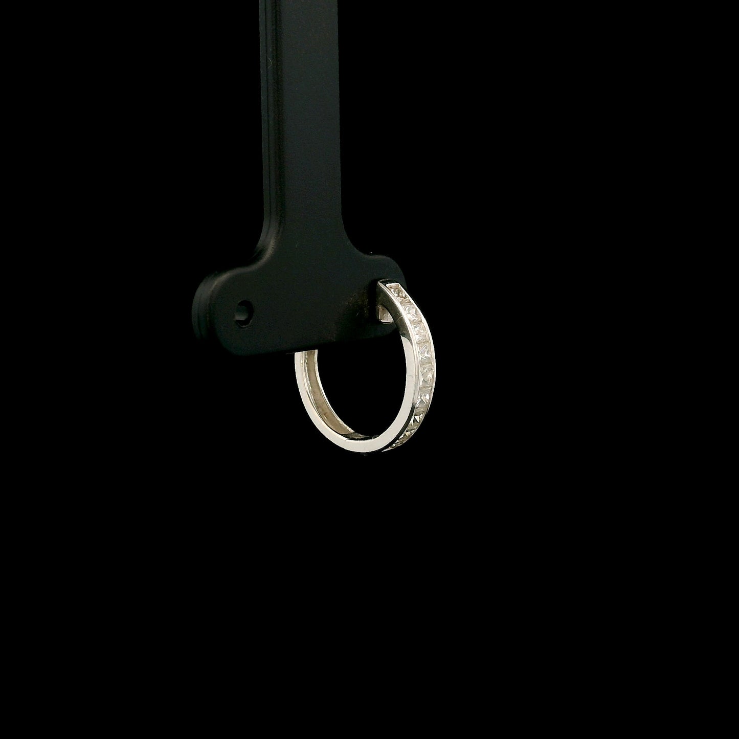 Men’s single diamond hoop earring in 18K white gold with princess cut diamonds