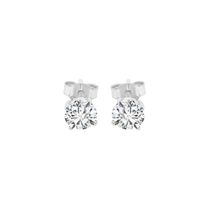 Solitaire Diamond Earrings In 18k White Gold.