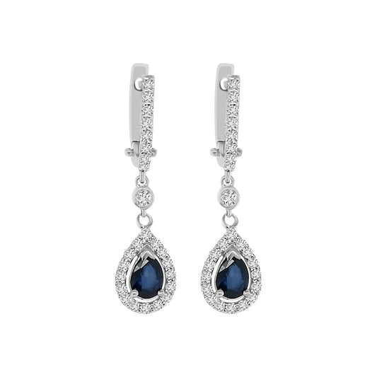 Diamond Huggie With Blue Sapphire Charm Earrings In 18k White Gold.