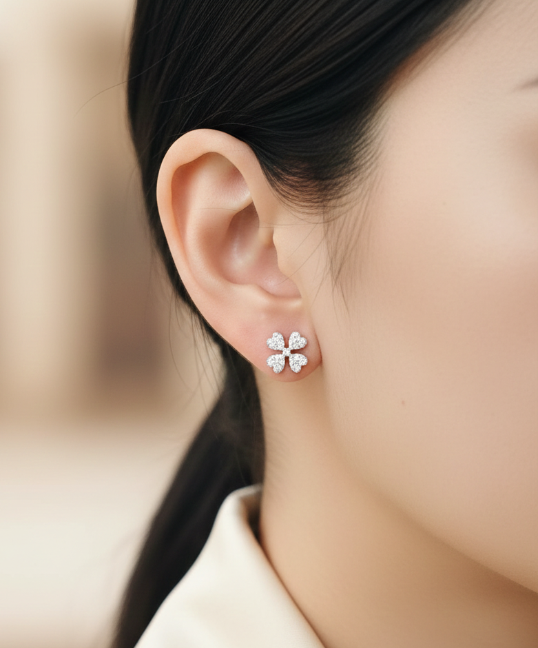 18K rose gold diamond rosette earrings with heart-shaped petal design and pavé-set diamonds by Emirates Diamonds