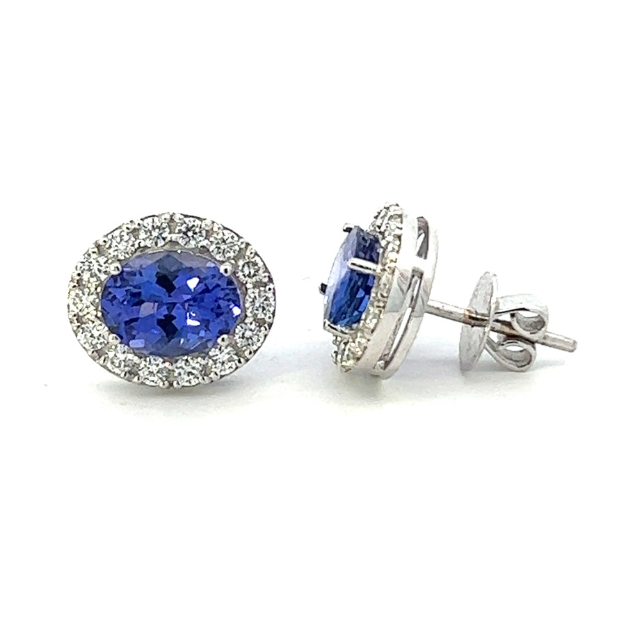 Tanzanite With Diamond Halo Stud Earrings In 18k White Gold.