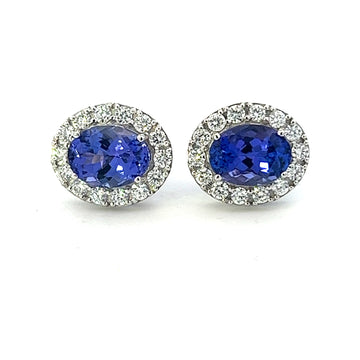Tanzanite With Diamond Halo Stud Earrings In 18k White Gold.