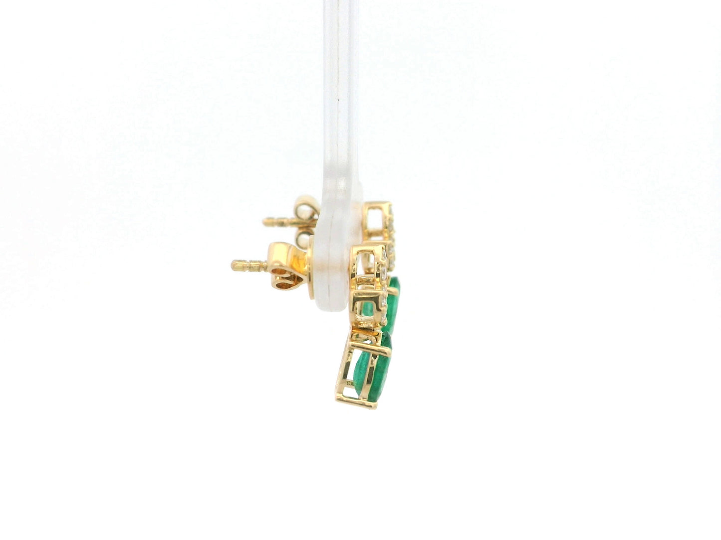 Emerald and diamond accent earrings in 18K yellow gold featuring 1.14 carat emeralds and 0.19 carat diamonds by Emirates Diamonds.