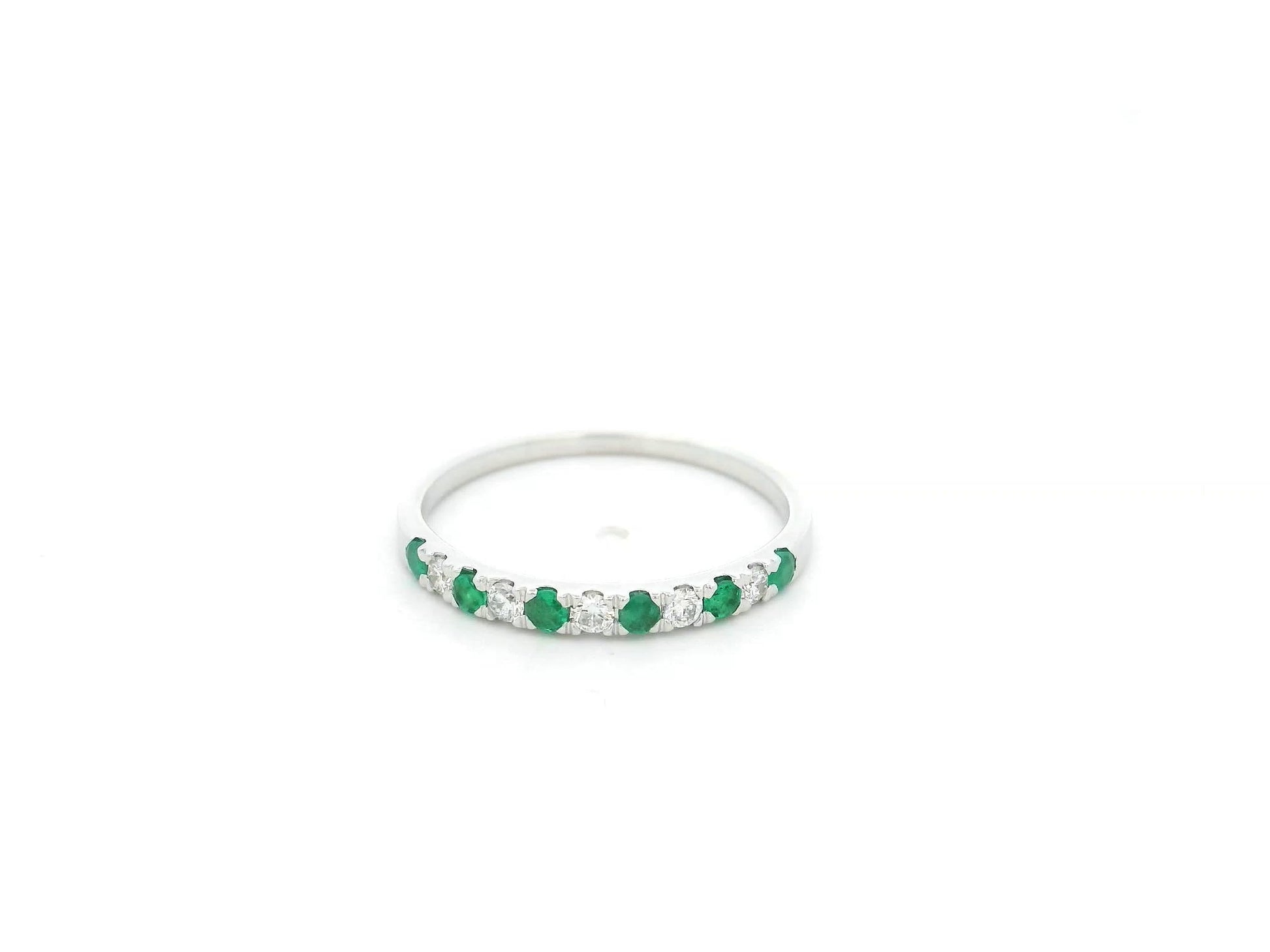 Emerald and diamond alternating band ring in 18K white gold by Emirates Diamonds