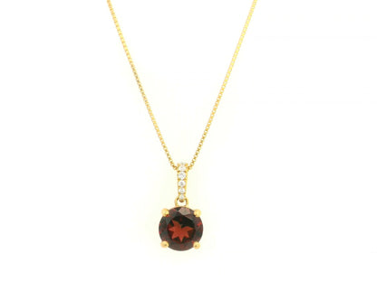 Round garnet and diamond pendant 2.03ct set in 18K yellow gold by Emirates Diamonds