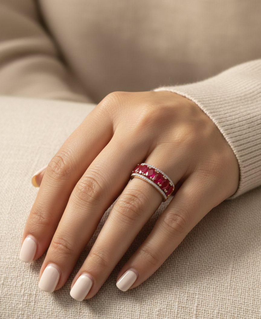 2.73 carat oval ruby and 0.21 carat diamond statement ring in 18K rose gold by Emirates Diamonds.