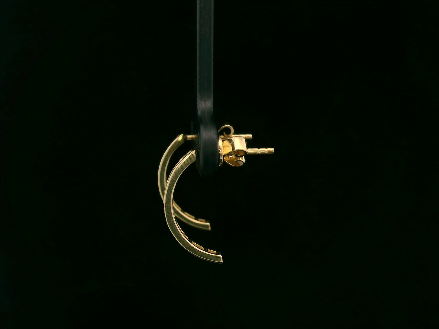 Diamond half hoop earrings with 0.31ct round diamonds set in 18K yellow gold by Emirates Diamonds