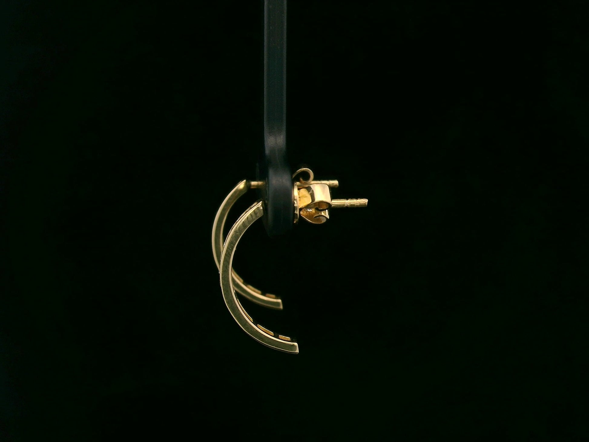 Diamond half hoop earrings with 0.31ct round diamonds set in 18K yellow gold by Emirates Diamonds