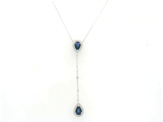 Blue sapphire and diamond drop necklace in 18K white gold featuring 1.00 carat sapphires and 0.24 carat diamonds by Emirates Diamonds.