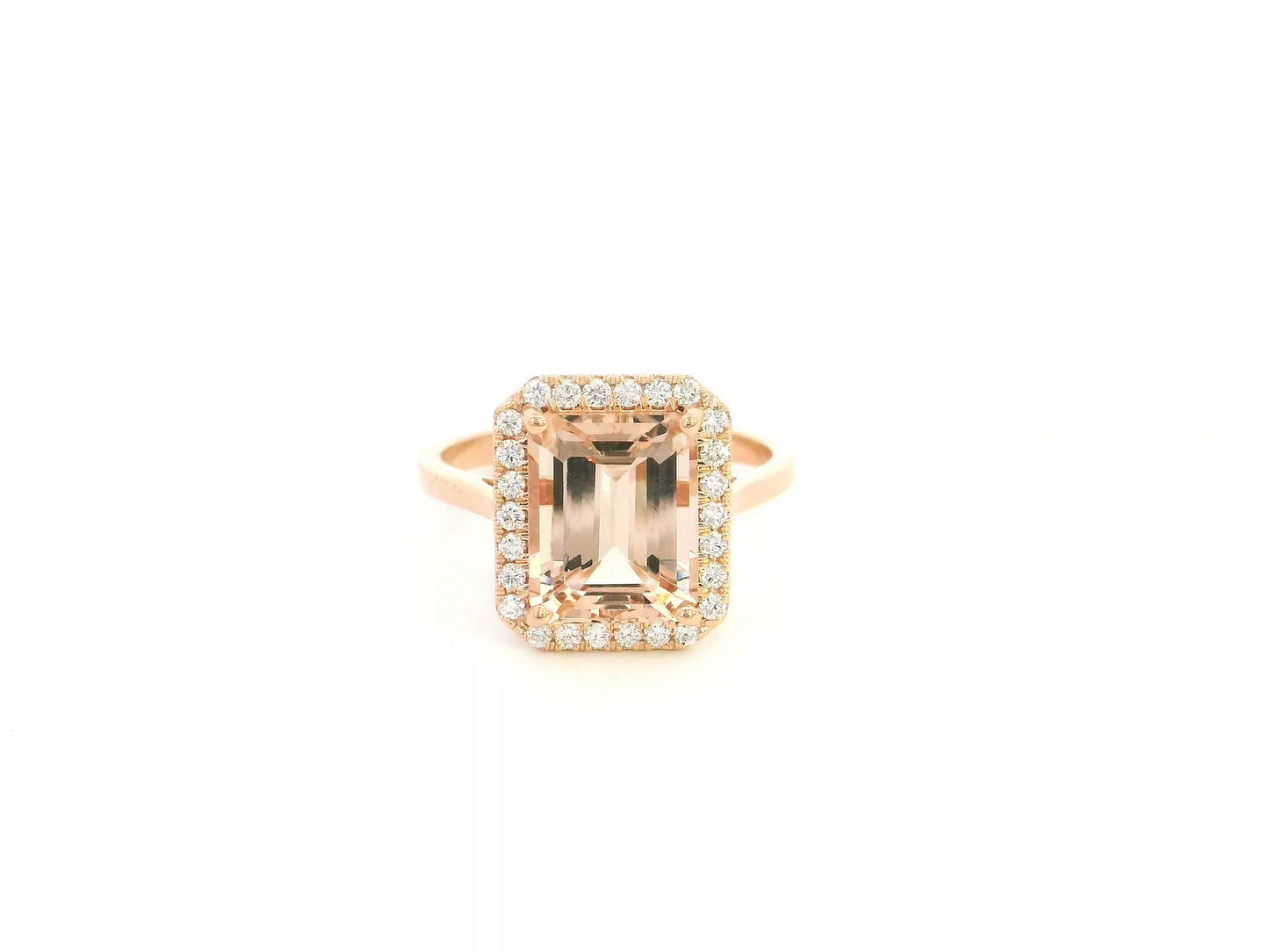 Emerald cut morganite halo ring with diamonds in 18K rose gold by Emirates Diamonds