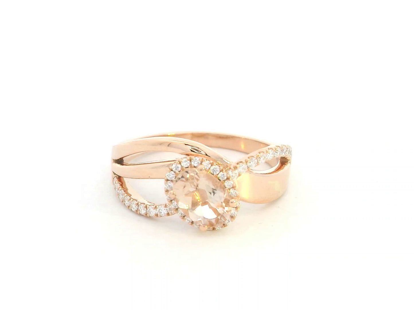 Morganite diamond halo wrap ring in 18K rose gold with oval morganite and diamond accents