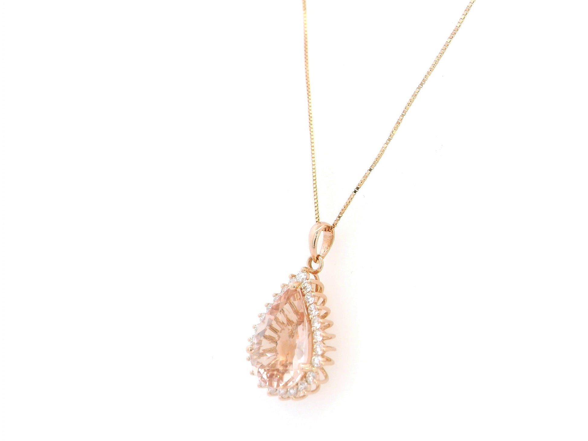 Morganite diamond pendant in 18K rose gold pear-shaped halo pendant – Emirates Diamonds