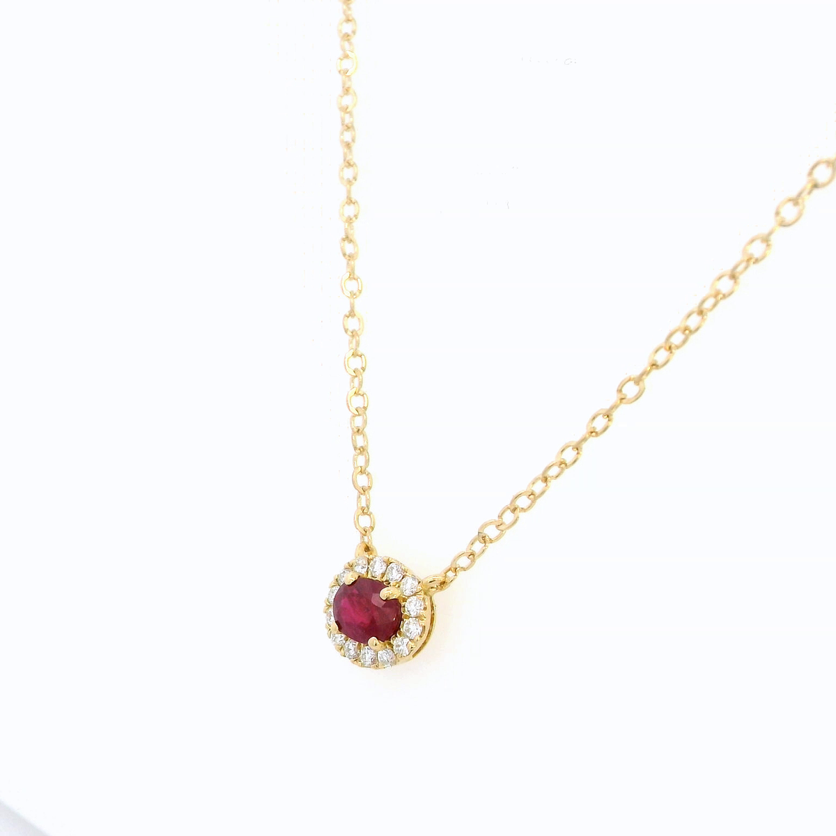 18K Yellow Gold Ruby and Diamond Halo Necklace – 0.42ct Ruby, 0.12ct Diamonds