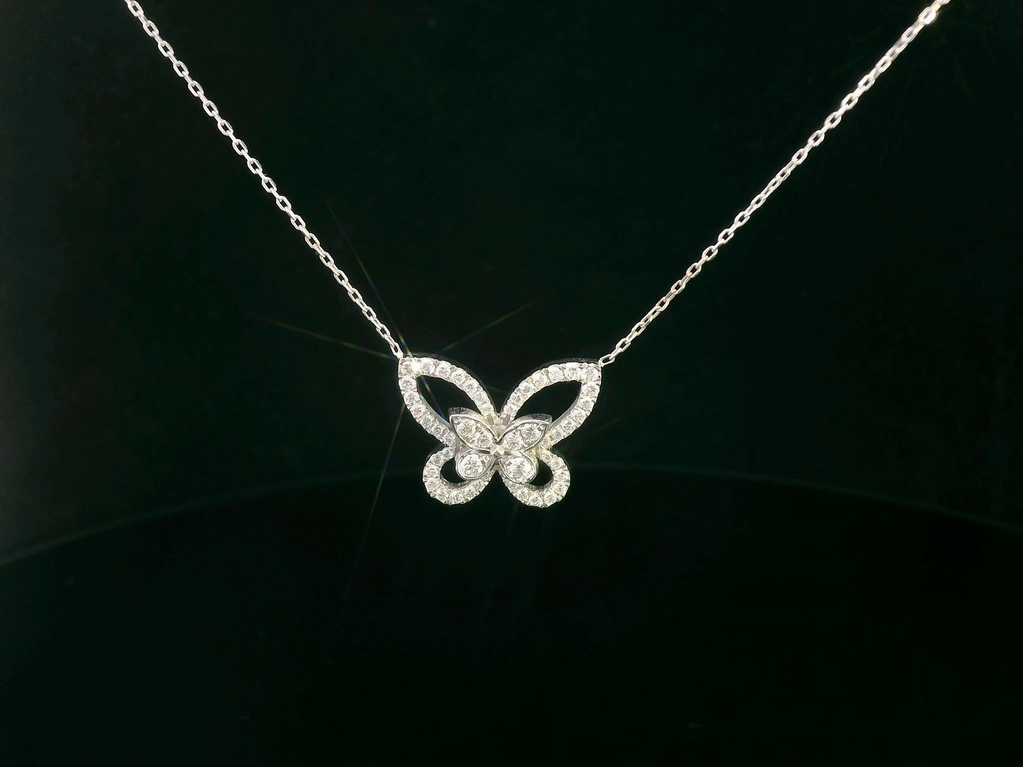 18K gold butterfly pendant featuring 0.41 CT natural diamonds in a delicate openwork design. Chain not included.