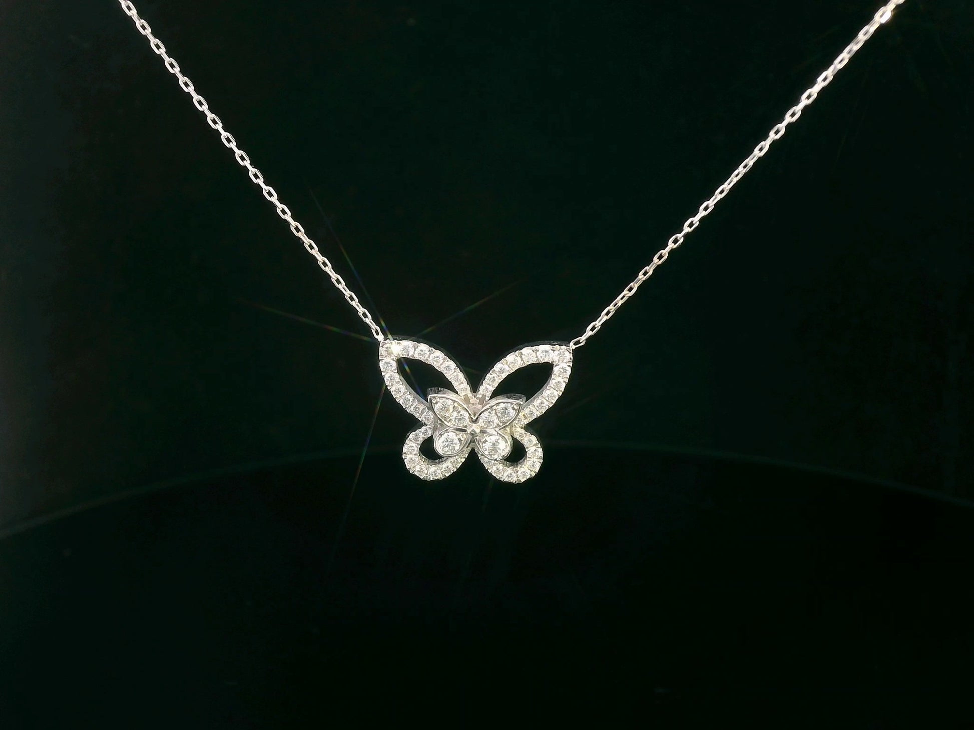 18K gold butterfly pendant featuring 0.41 CT natural diamonds in a delicate openwork design. Chain not included.