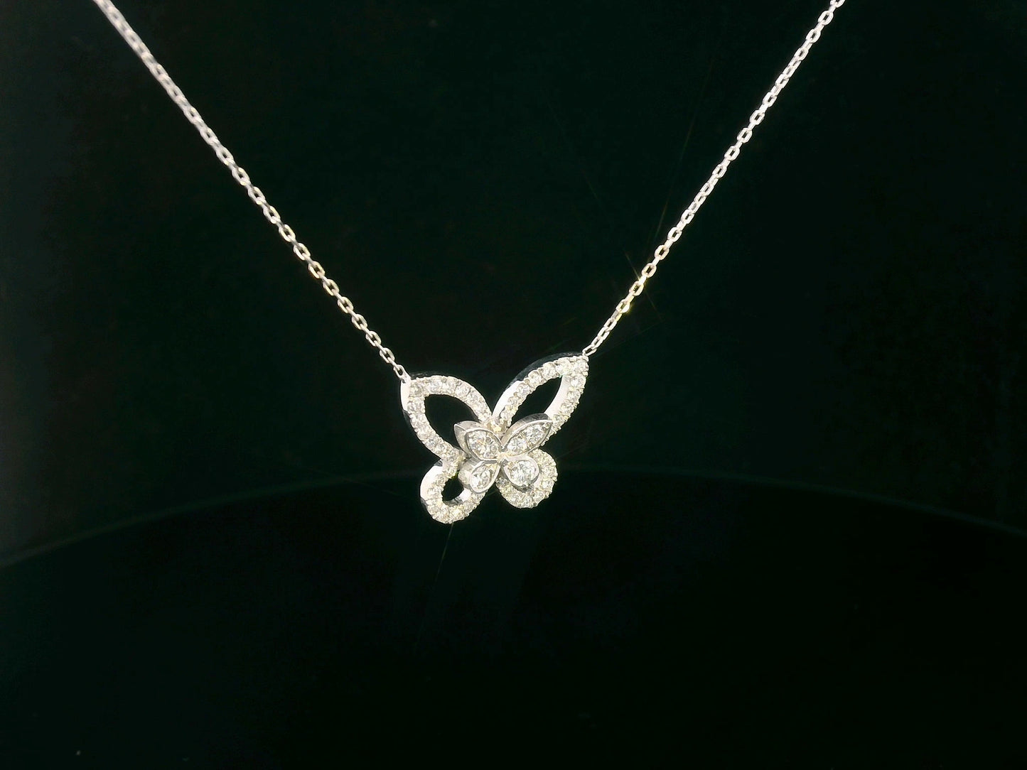 18K gold butterfly pendant featuring 0.41 CT natural diamonds in a delicate openwork design. Chain not included.