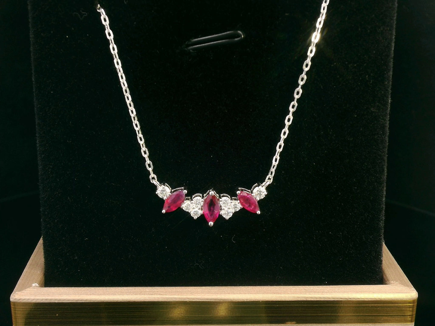 18K gold ruby and diamond necklace with 0.69 Ct marquise-cut rubies and 0.26 Ct diamonds, luxury gemstone jewelry