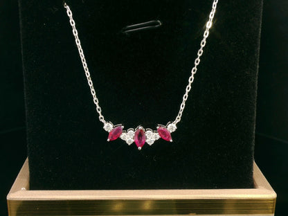 18K gold ruby and diamond necklace with 0.69 Ct marquise-cut rubies and 0.26 Ct diamonds, luxury gemstone jewelry