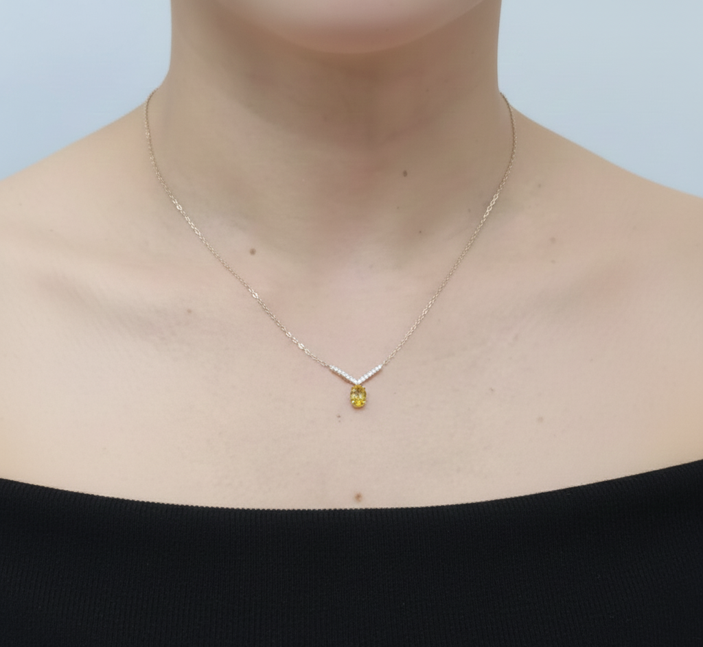 18K yellow gold yellow sapphire and diamond V-pendant necklace by Emirates Diamonds