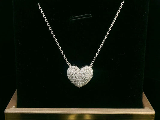 Diamond heart pendant necklace in 18K gold with 0.43 carat pavé diamonds

