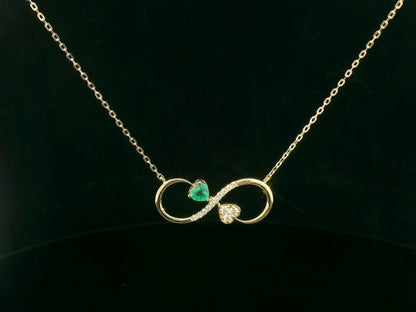 18K gold infinity necklace with emerald and diamond heart
