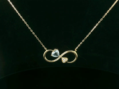 18K yellow gold infinity necklace with aquamarine and diamonds