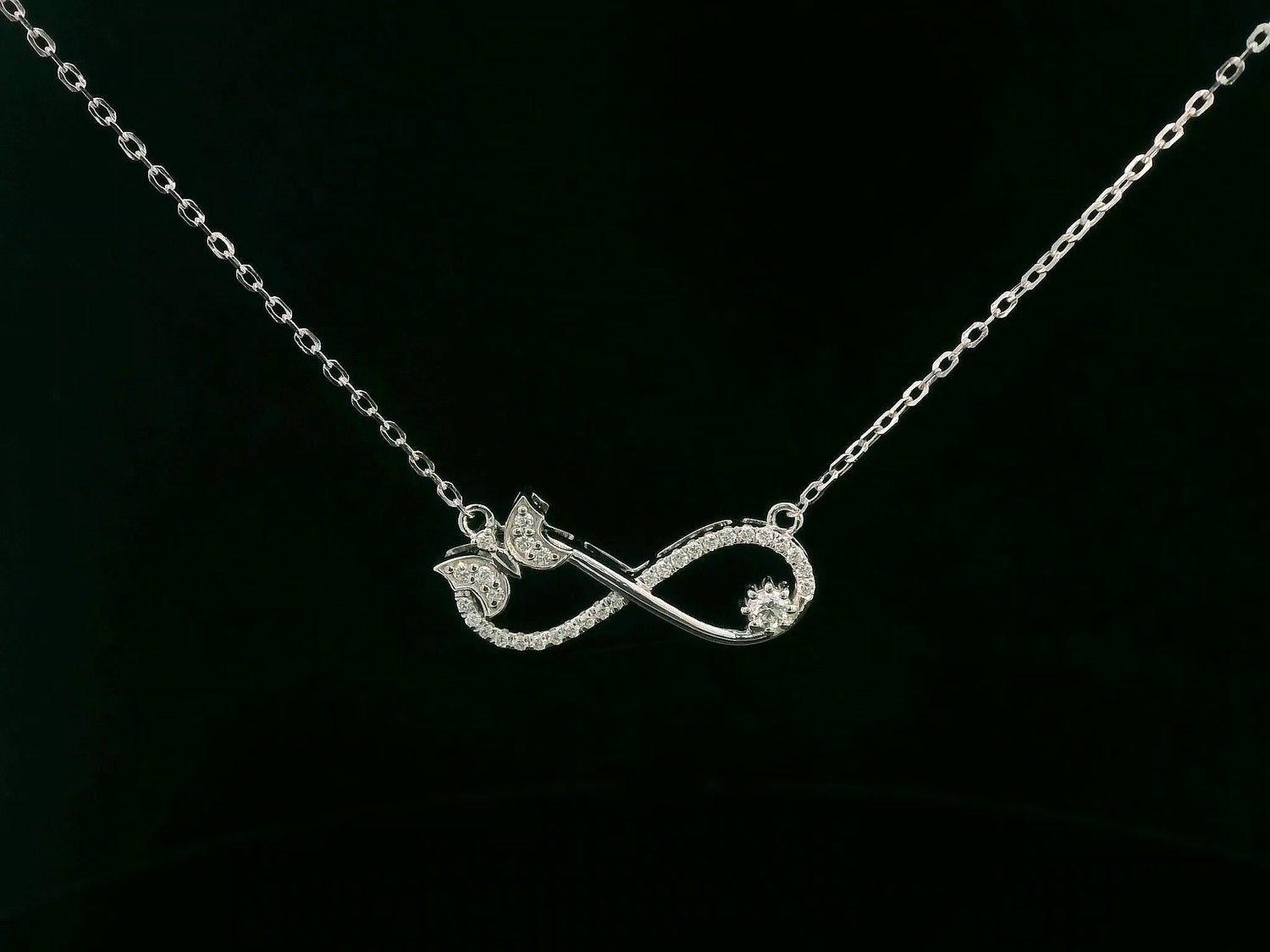 18K White Gold Diamond Infinity Bow Necklace, 0.23 Carat Round Diamonds, Elegant Symbolic Pendant