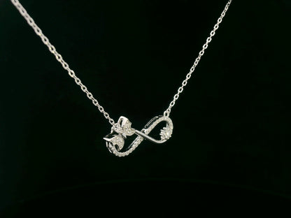 18K White Gold Diamond Infinity Bow Necklace, 0.23 Carat Round Diamonds, Elegant Symbolic Pendant