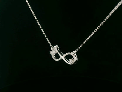 18K White Gold Diamond Infinity Bow Necklace, 0.23 Carat Round Diamonds, Elegant Symbolic Pendant