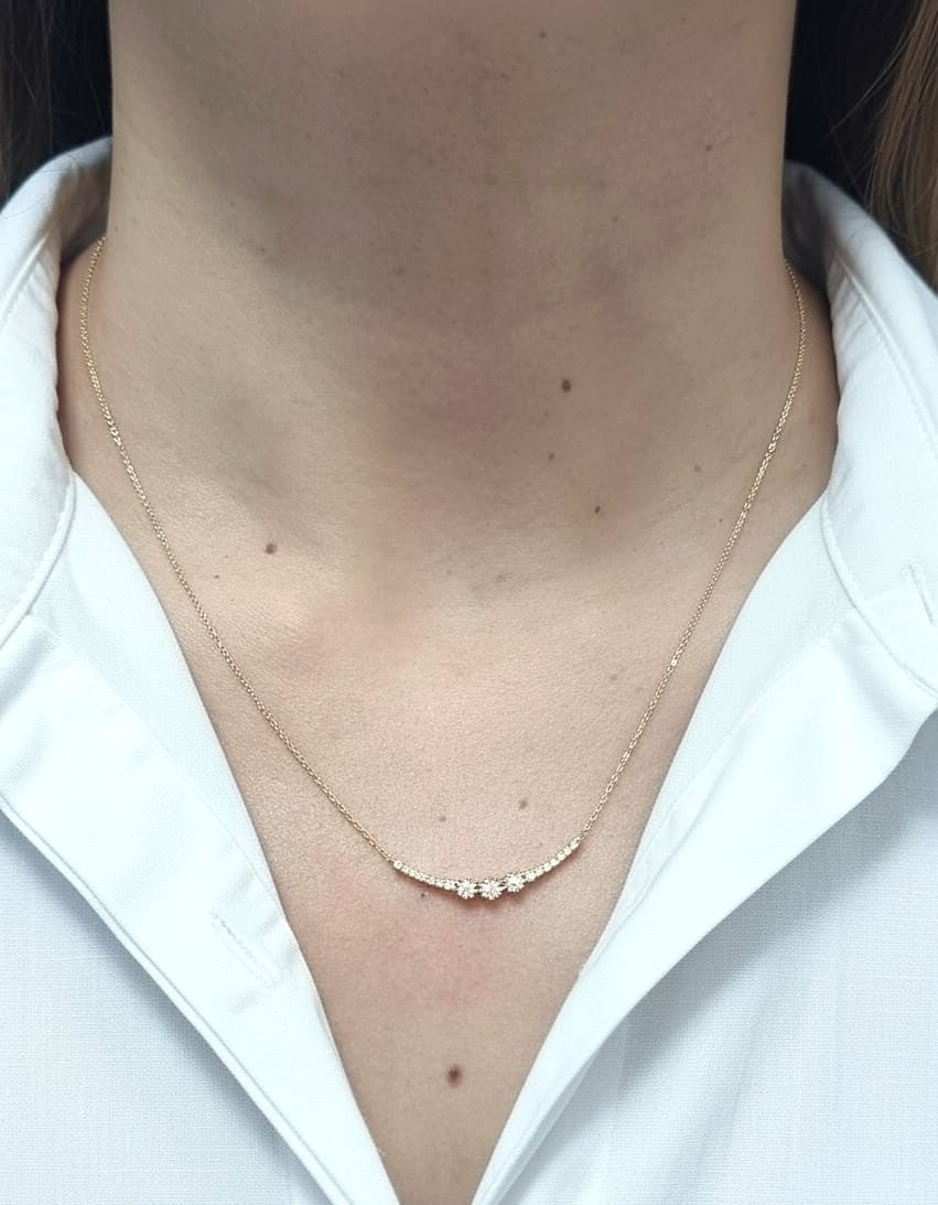 18K yellow gold diamond curve necklace – 0.15ct round brilliant diamonds in curved bar design, fine jewelry by Emirates Diamonds