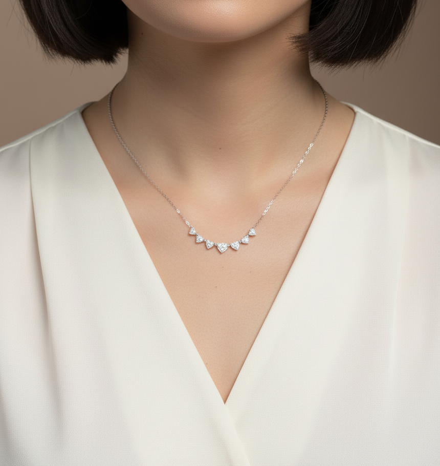 Diamond heart cascade necklace in 18K white gold – pavé hearts, 0.47 carat diamonds, Emirates Diamonds.