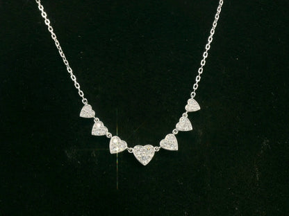 Diamond heart cascade necklace in 18K white gold – pavé hearts, 0.47 carat diamonds, Emirates Diamonds.