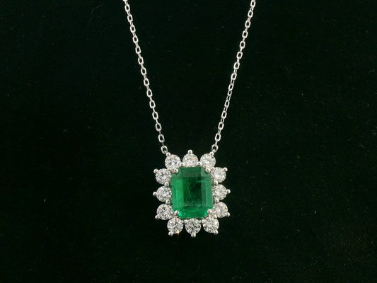 Emerald and diamond halo necklace in 18K white gold – 3.09ct emerald with 1.41ct diamond halo, fine jewelry by Emirates Diamonds