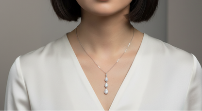 18K white gold diamond drop necklace featuring three pear-shaped pavé-set diamond drops – Emirates Diamonds