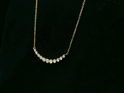 18K yellow gold graduated diamond bar necklace – 0.47ct round brilliant diamonds, Emirates Diamonds