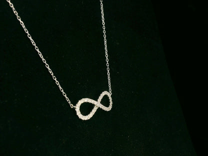 18K white gold infinity necklace with pavé-set natural diamonds – Emirates Diamonds