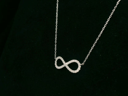 18K white gold infinity necklace with pavé-set natural diamonds – Emirates Diamonds