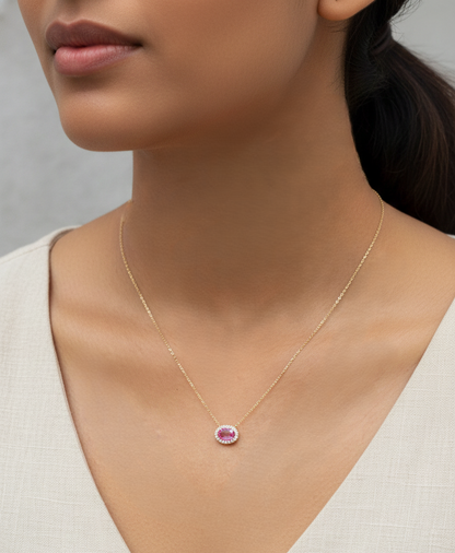 18K yellow gold pink sapphire and diamond halo necklace – 0.75ct sapphire with 0.10ct diamonds by Emirates Diamonds