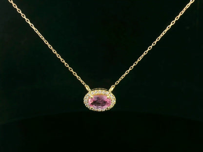 18K yellow gold pink sapphire and diamond halo necklace – 0.75ct sapphire with 0.10ct diamonds by Emirates Diamonds