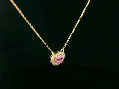 18K yellow gold pink sapphire and diamond halo necklace – 0.75ct sapphire with 0.10ct diamonds by Emirates Diamonds