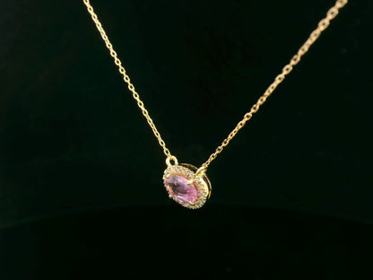 18K yellow gold pink sapphire and diamond halo necklace – 0.75ct sapphire with 0.10ct diamonds by Emirates Diamonds
