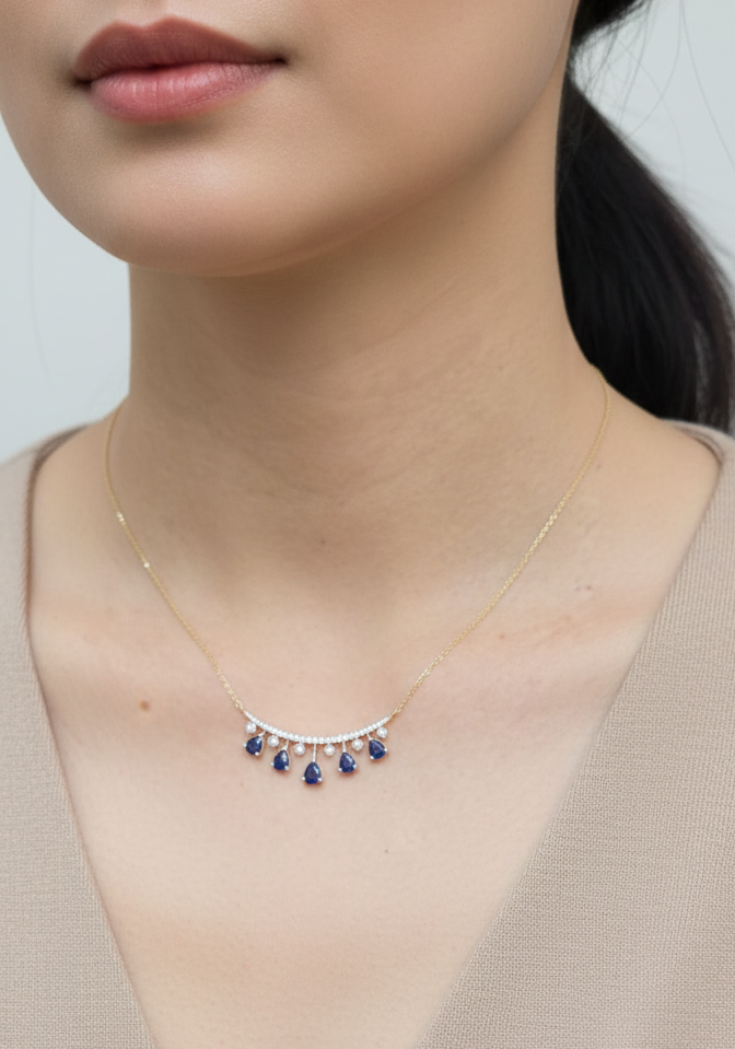 18K white gold curved bar necklace with 1.78ct blue sapphires and 0.63ct diamonds – Emirates Diamonds