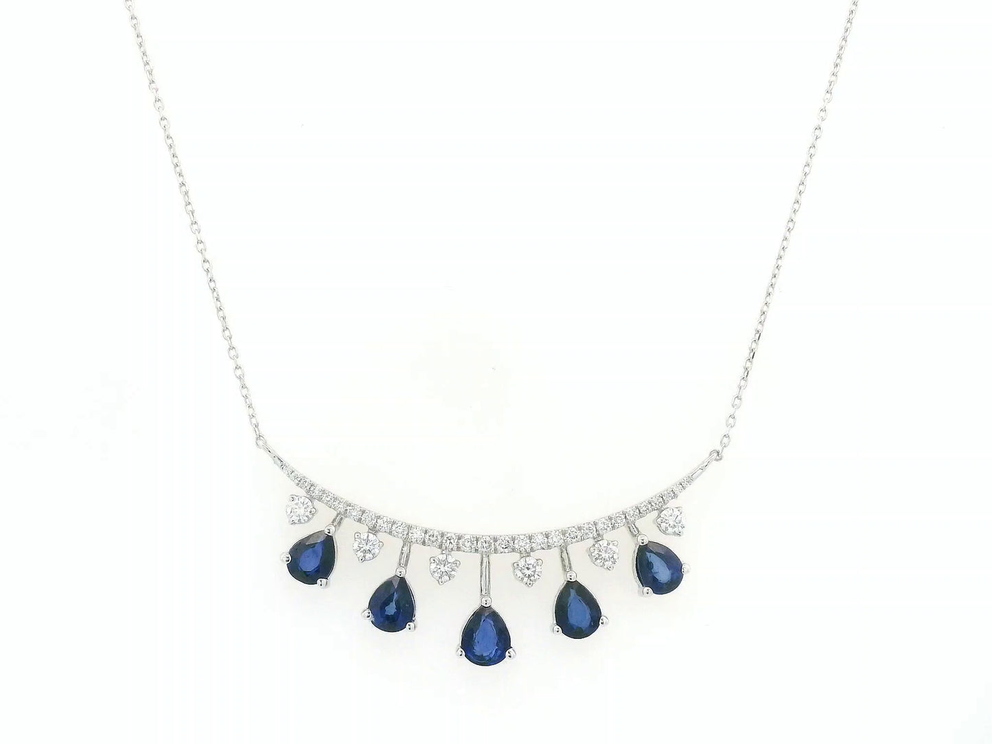 18K white gold curved bar necklace with 1.78ct blue sapphires and 0.63ct diamonds – Emirates Diamonds