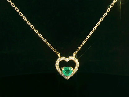 18K yellow gold heart-shaped emerald necklace with diamond halo – fine jewelry by Emirates Diamonds