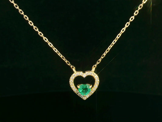 18K yellow gold heart-shaped emerald necklace with diamond halo – fine jewelry by Emirates Diamonds